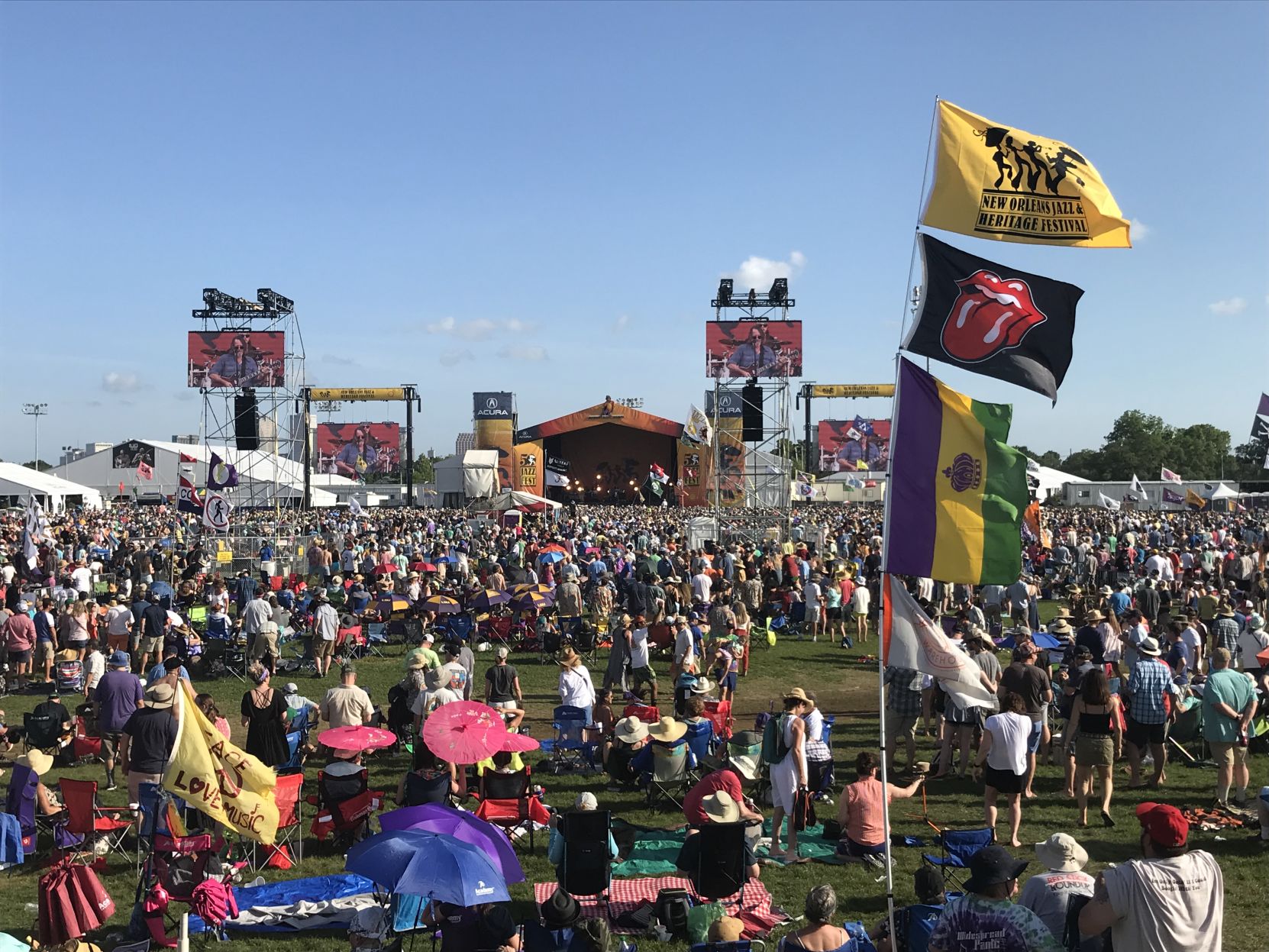2019 jazz fest rolling stones flag crowd